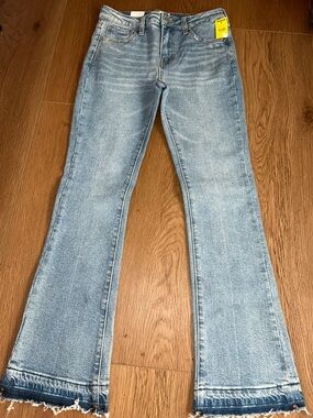 New with tags!  Girl’s Light Blue Flared Jeans - size 14